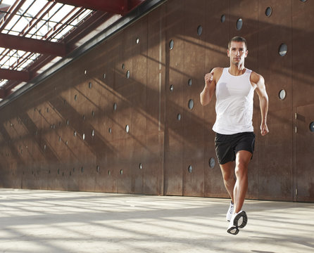 young man running on the street