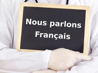 Doctor shows information: we speak french