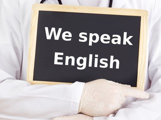 Doctor shows information: we speak english