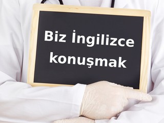 Doctor shows information: we speak turkish