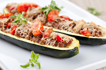 Zucchini halves stuffed with minced meat