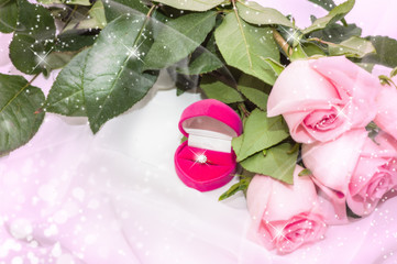 pink roses with diamond ring