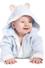 portrait of a cheerful child in blue bathrobe