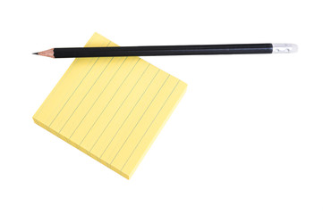 Fototapeta premium Sharp black pencil on a pack of post-it notes