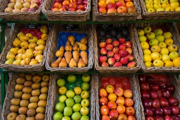 Fruits in baskets on market place