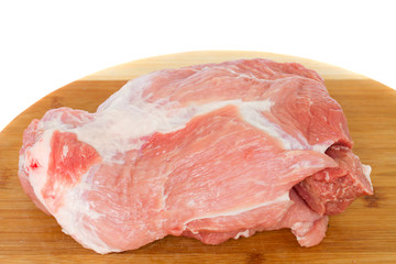 meat of pork on wooden board