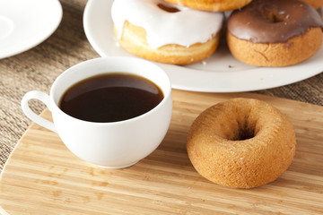 Fresh Homemade Donuts with Black Coffee