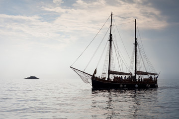 Fototapeta na wymiar sailboat and island