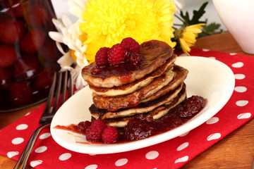 delicious sweet pancakes on wooden background