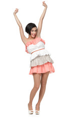 Dancing girl in colored dress, isolated on white