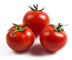 three fresh tomatoes