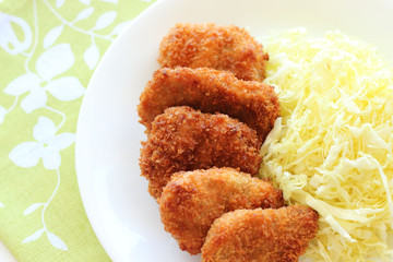 Breaded pork cutlet with cabbage