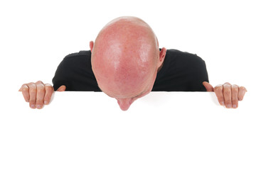Bald man with white board