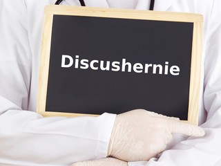 Doctor shows information: spinal disc herniation