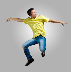 Young man dancing and jumping