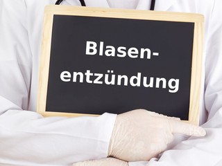 Doctor shows information on blackboard: cystitis
