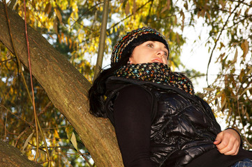 Beautiful woman in autumn forrest