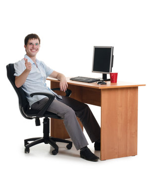 Businessman Behind A Table With Computer