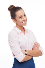 Young businesswoman with arms folded