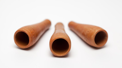 Three Smoking clay pipe