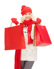 young girl with shopping bags