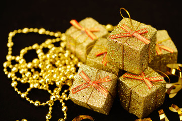 Fototapeta na wymiar Gold box with gifts.