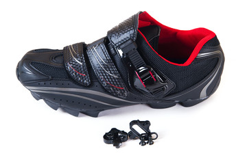 Isolated on white MTB bike shoe and cleat