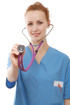 A female doctor with a stethoscope - on white background