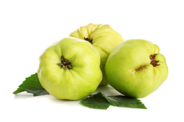 sweet quinces with leaves, isolated on white
