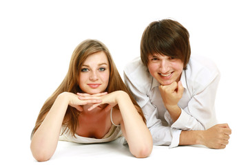 A young couple lying on the floor