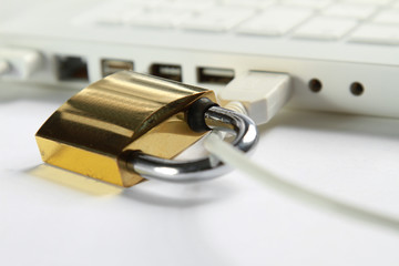 A closed lock on a laptop as a symbol of security