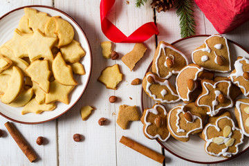 Close-up of two plates with different Christmas cookies