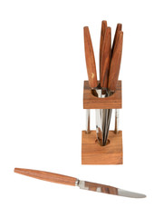 Very old set of knives in a stand, isolated