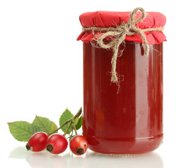 jar with hip roses jam and ripe berries, isolated on white