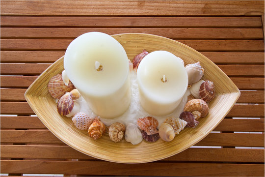 Decorative candles and shells.