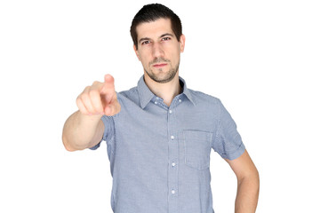 A portrait of attractive young man pointing his finger