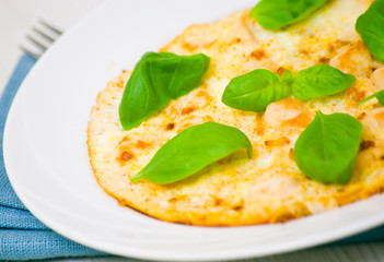Omelet with chicken and basil
