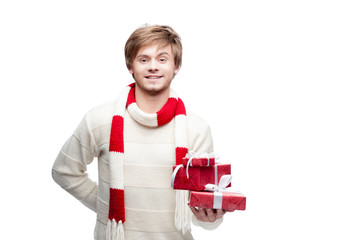 young smiling man holding christmas gifts