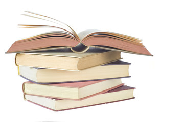 opened book, close up isolated on white background