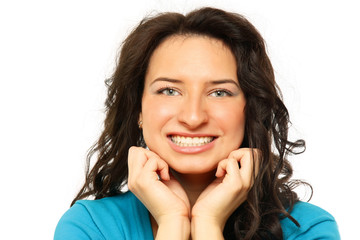 Fototapeta premium A portrait of young smiling woman on white background