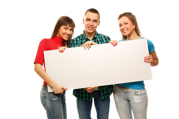 The group of young people holds the empty board for the text
