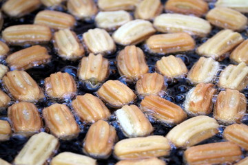 Turkish tulumba sweet fried in oil. Ottoman Palace Donuts