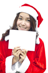 Girl in Santa holding banner.