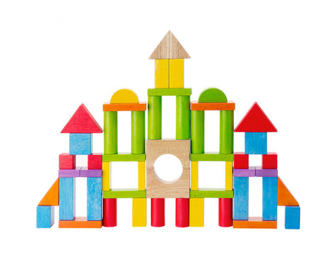 Colorful wooden toy castle on white