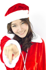Beautiful young santa clause woman, isolated