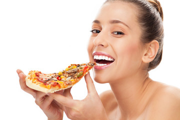 Woman eating pizza