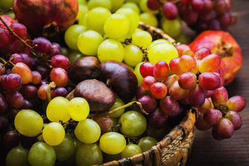 Wicker basket with autumn fruits