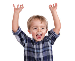 Excited boy with arms raised cheering