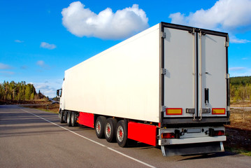 Trailer on the sweden rural road in sunny day