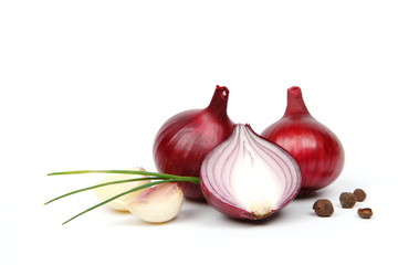 onion with garlic and spices isolated on white background
